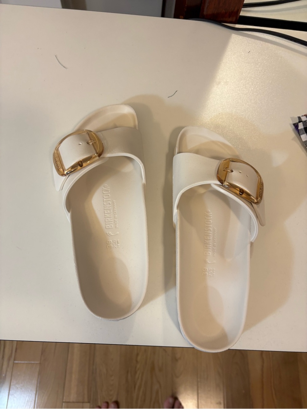 Birkenstock White EVA Slide Sandal with Gold Buckle